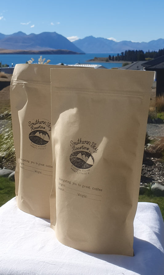 Two bags of coffee, with Southern Sky Roasters stamped on them.  The brown bags are 500g each. The Blend isn't written on these bags as the customer can select which 2 blends they want.
Southern Sky Roasters
Lake Tekapo, New Zealand
Organic Fair Trade Coffee
Artisan Roastery