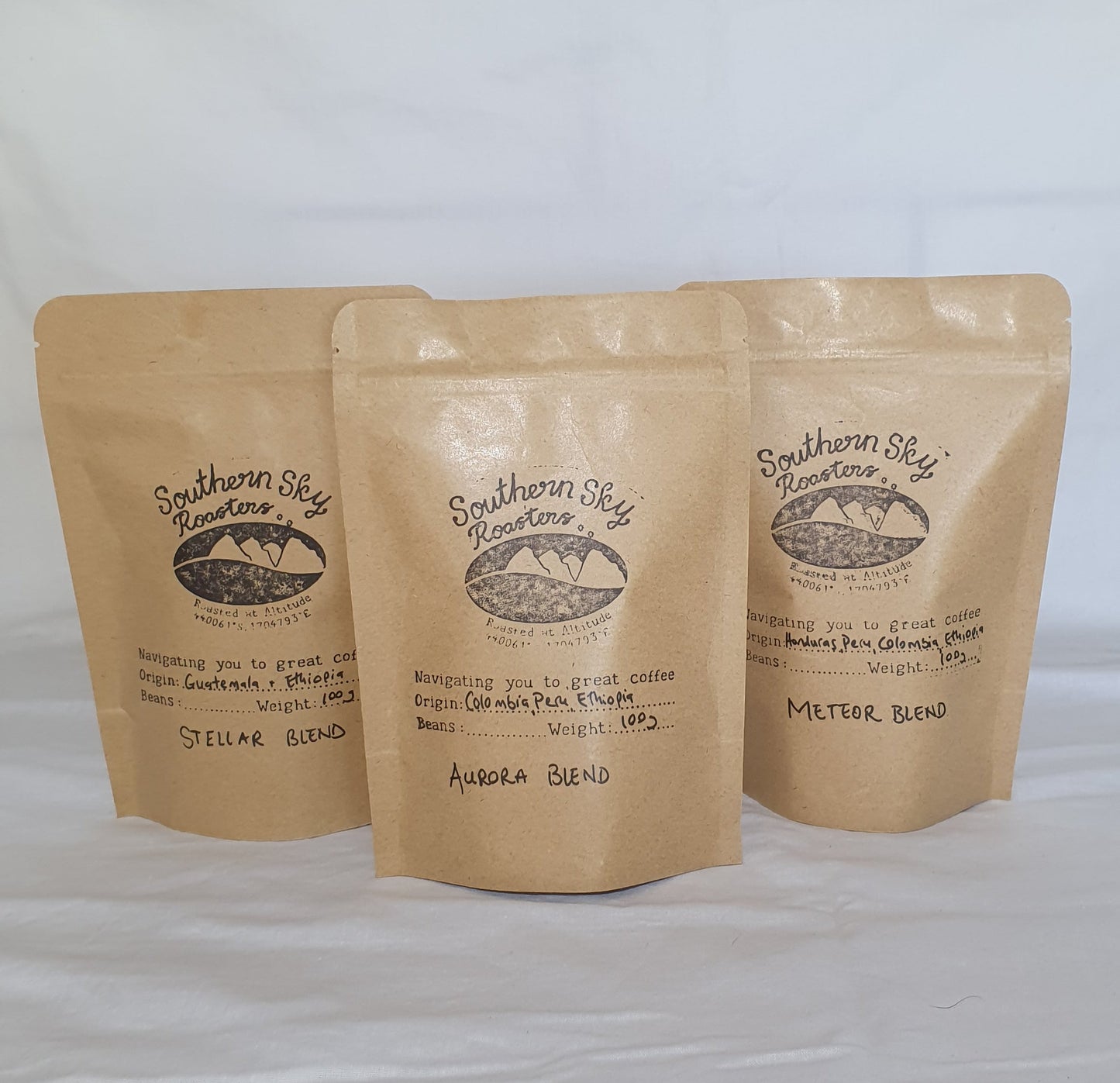 Three standing pouches of Southern Sky coffee blends. From left to right, the pouches are labeled 'Aurora Blend', 'Stellar Blend', and 'Meteor Blend'.
Organic fair trade coffee
Southern Sky Roasters
Lake Tekapo, New Zealand
Artisan Coffee Roasters