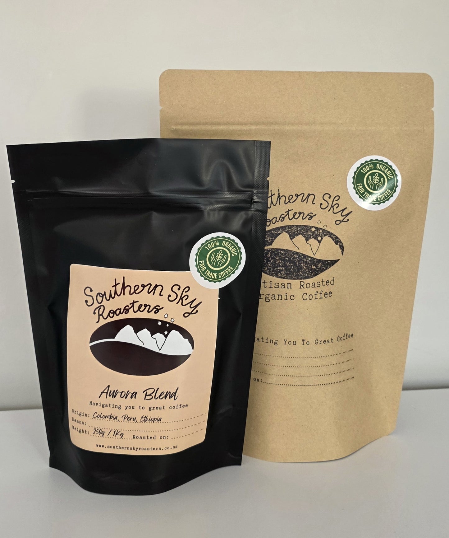 Two bags of coffee, both labelled 'Southern Sky Roasters' with 'Aurora Blend' written on them. The Aurora Blend is a blend of beans from Colombia, Peru and Ethiopia. The black bag is 250g, and the brown bag is 500 g
Southern Sky Roasters
Artisan Roastery Lake Tekapo, New Zealand
Coffee