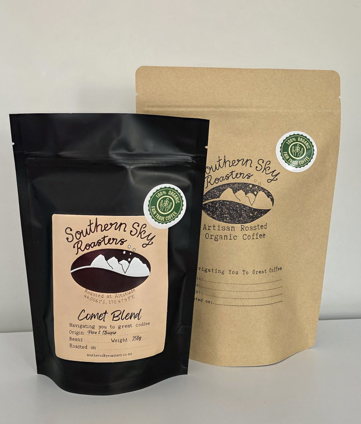 Two bags of coffee, both labelled 'Southern Sky Roasters' with 'Comet Blend' written on them. The Comet Blend is a blend of beans from Peru & Ethiopia. The black bag is 250g, and the brown bag is 500 g
Comet Blend
Southern Sky Roasters
Lake Tekapo, New Zealand
Buy Artisan Coffee
Organic Coffee
Fair trade coffee