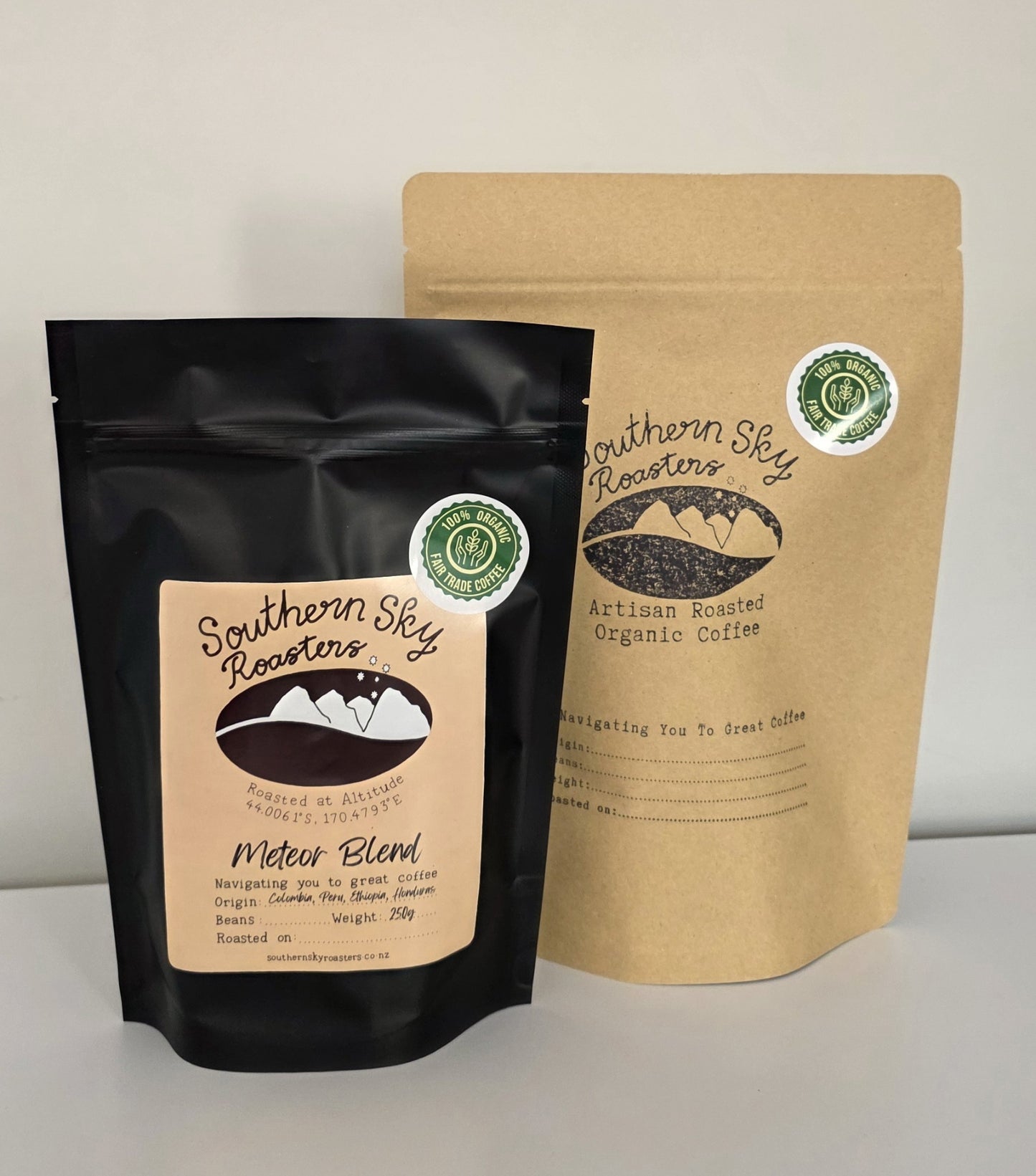 Two bags of coffee, both labelled 'Southern Sky Roasters' with 'Meteor Blend' written on them. The Meteor Blend is a blend of coffee beans from Honduras, Peru, Colombia & Ethiopia. The black bag is 250g, and the brown bag is 500 g.
Artisan Coffee
Meteor Blend
Southern Sky Roasters
Lake Tekapo, New Zealand
Organic Fair Trade Coffee