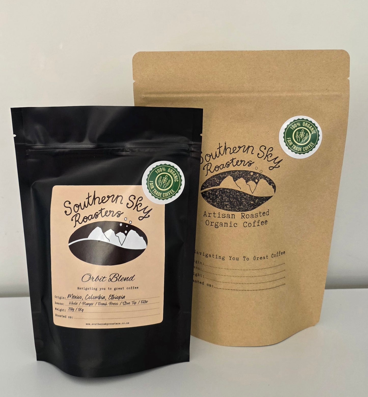 Two bags of coffee, both labelled 'Southern Sky Roasters' with 'Orbit Blend' written on them. Orbit Blend is a blend of Mexican, Colombian and Ethiopian beans. The black bag is 250g, and the brown bag is 500 g
Southern Sky Roasters
Organic coffee
Specialty Coffee
Lake Tekapo, New Zealand
Artisan Roastery