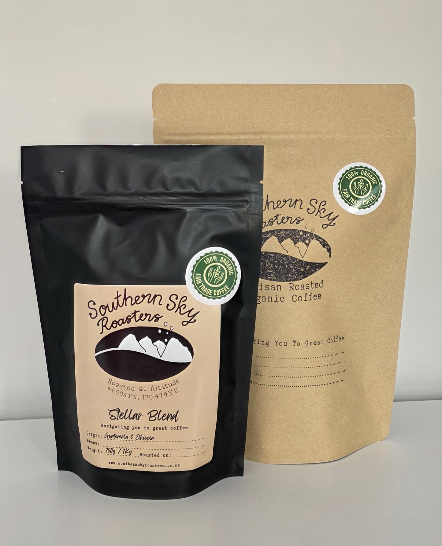 Two bags of coffee, both labelled 'Southern Sky Roasters' with 'Stellar Blend' written on them. Stellar Blend is a blend of Guatemalen and Ethiopian beans. The black bag is 250g, and the brown bag is 500 g
Southern Sky Roasters
Organic coffee
Lake Tekapo, New Zealand
Artisan Roastery